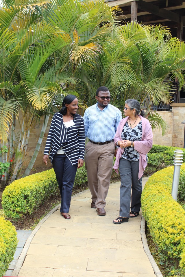 Neema Camara discusses tobacco control in Tanzania with colleague Rogath Kishimba and Indu Ahluwalia.